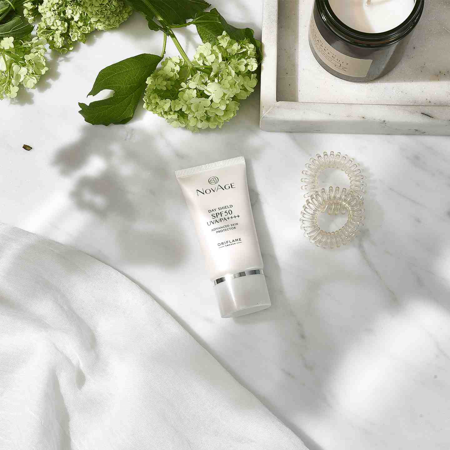 شیلد ضدآفتاب نوایج با SPF50 اوریفلیم